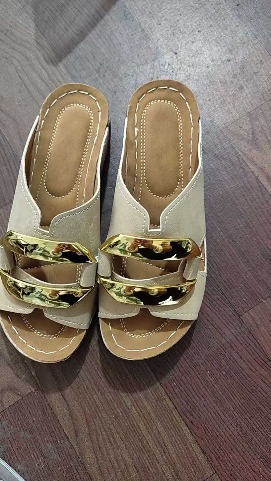 Roman style platform flip-flop sandals in white, black, khaki, and sea blue on a solid background