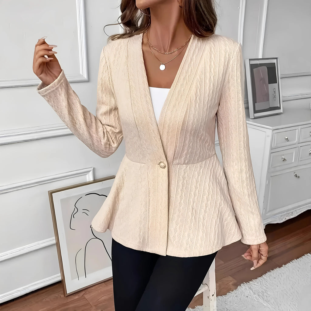 Women's apricot coloured tight fit knitted cardigan with jacquard pattern and one button front