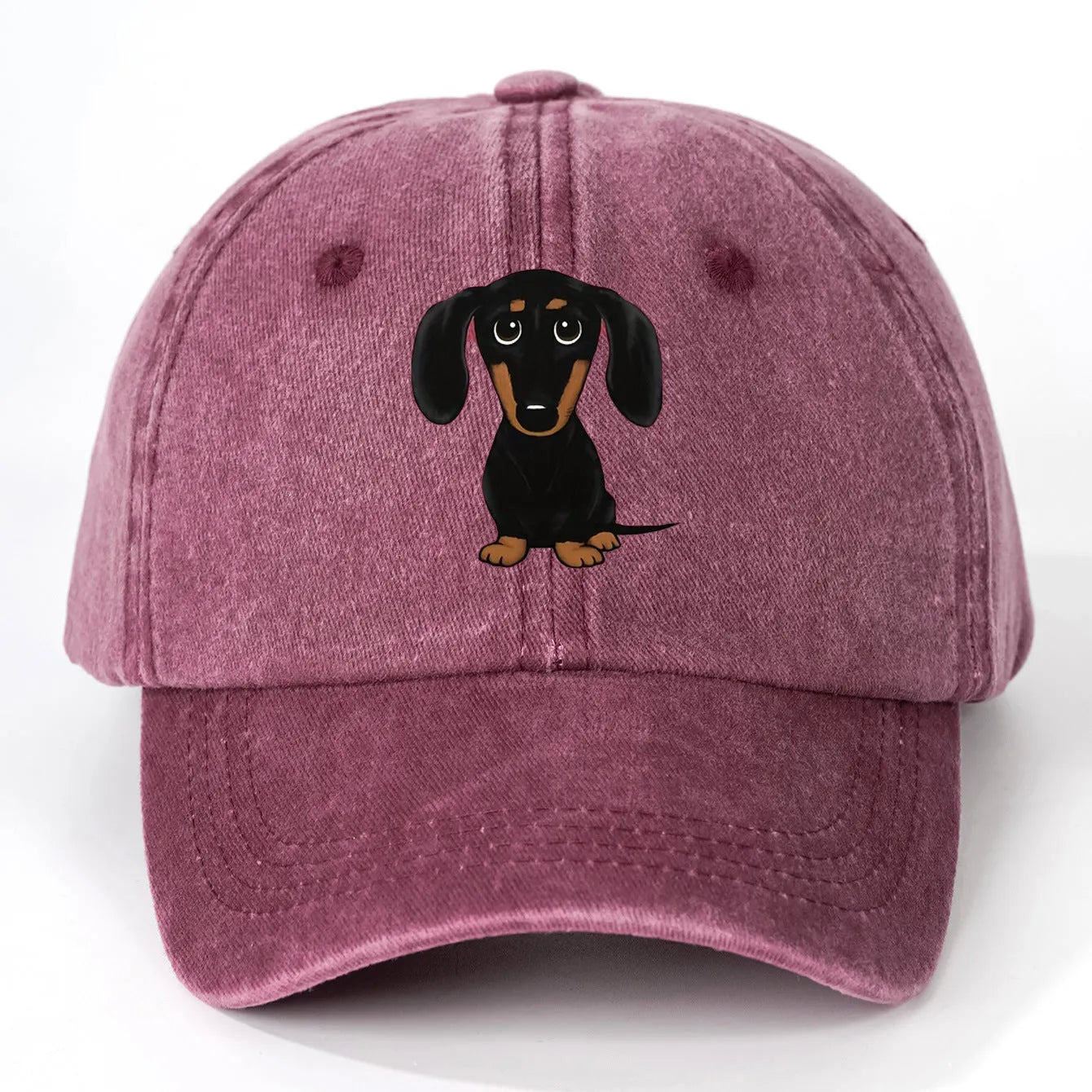 Retro washed baseball cap with a machine-embroidered dachshund dog print on the front.