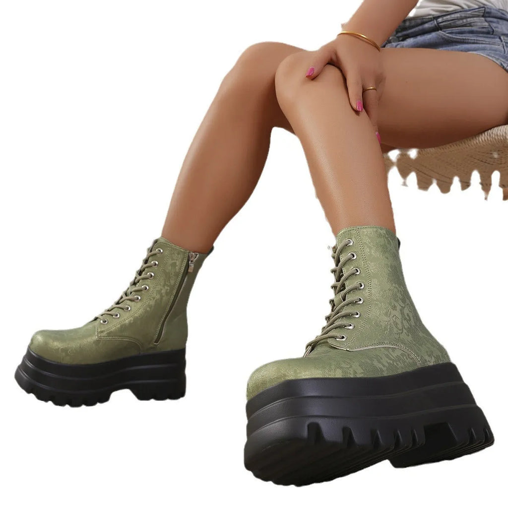 Women's white retro platform ankle boots with patchwork design and side zipper.