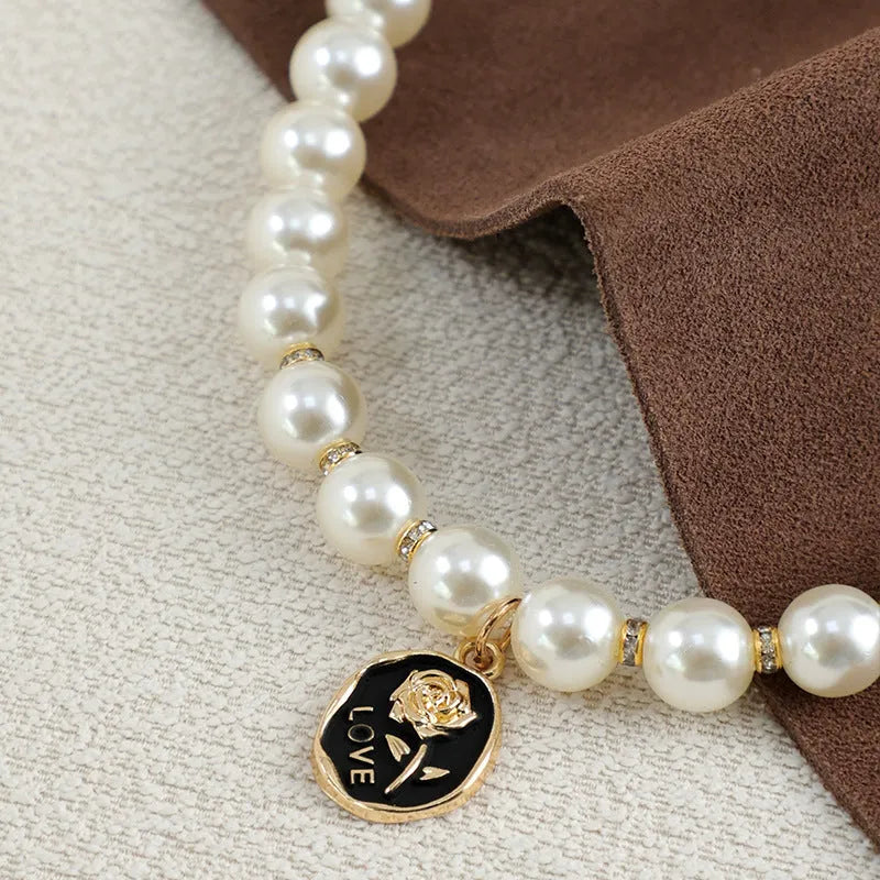 Retro plastic pearl necklace collar for pets with black rose flower design and adjustable scarf