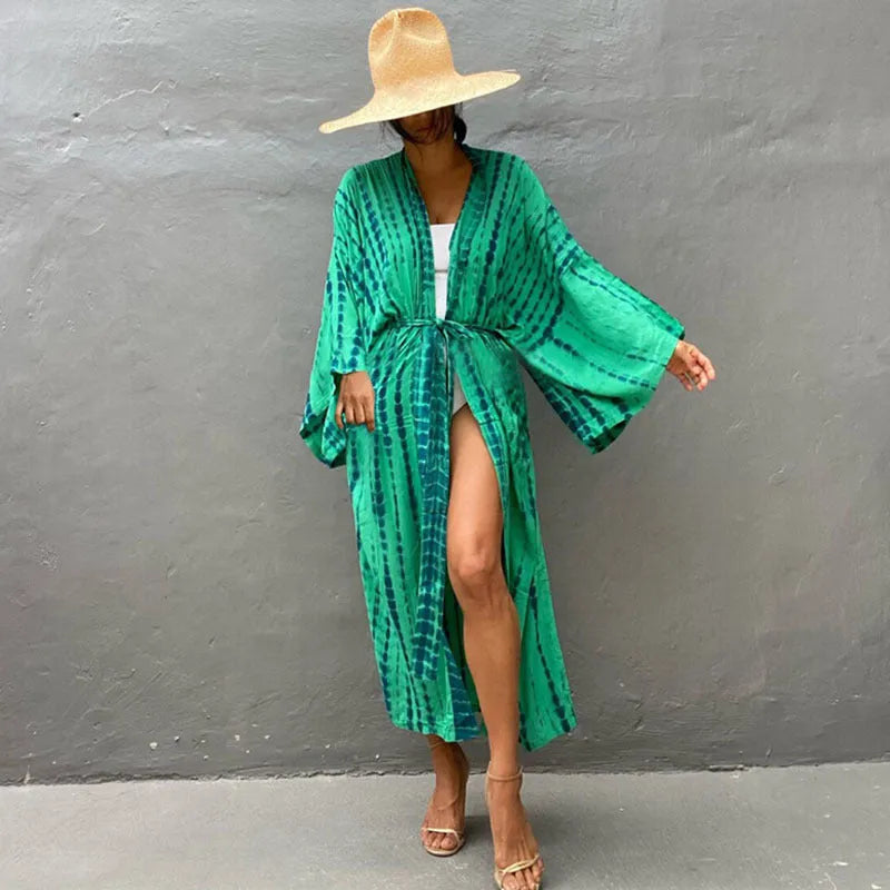 Loose cotton beach cover-up shirt in a printed design on a mannequin