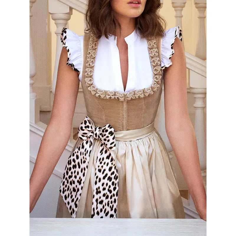 Khaki Oktoberfest beer style women's dress with elegant cut on mannequin