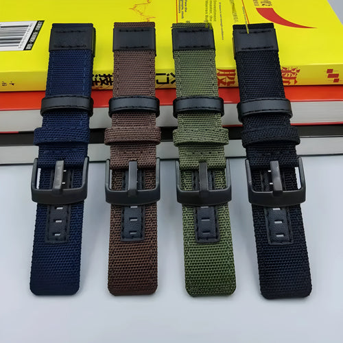 Oxford cloth canvas watch strap in camouflage colour, shown alongside black and blue options.