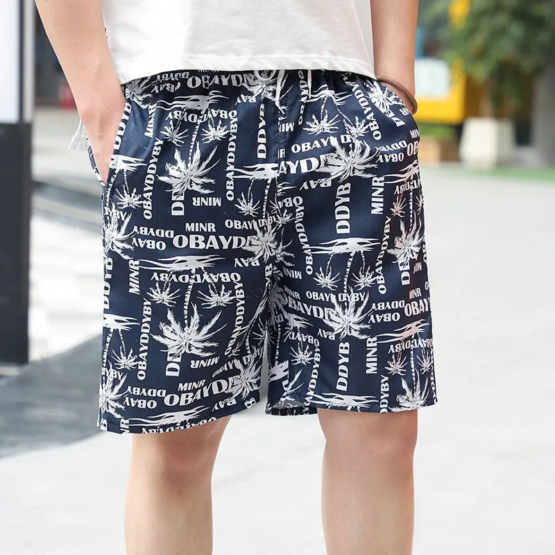 Men's floral printed five-point swimming trunks in free size made of polyester