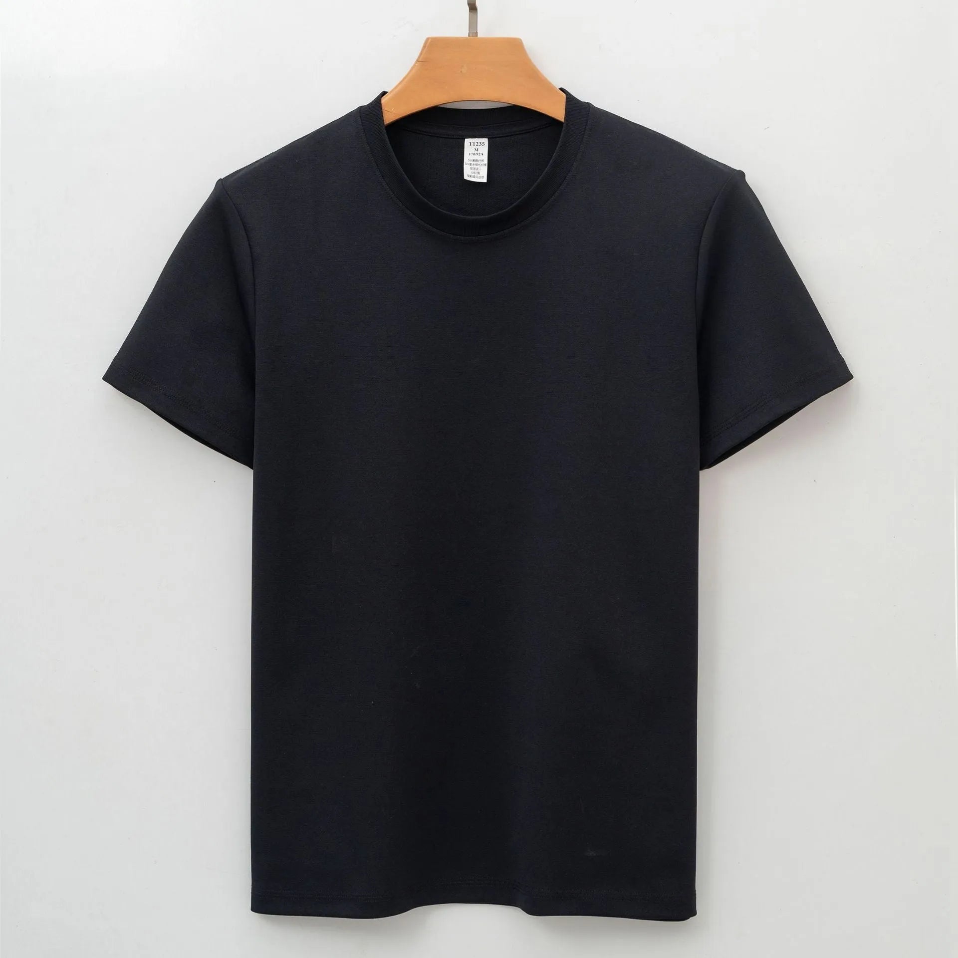 Men's solid colour quick-dry antibacterial short sleeve t-shirt on a hanger.