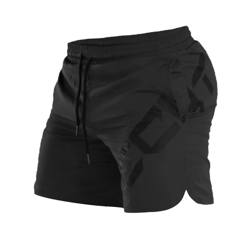 Man wearing black knee-length nylon running shorts during summer training.
