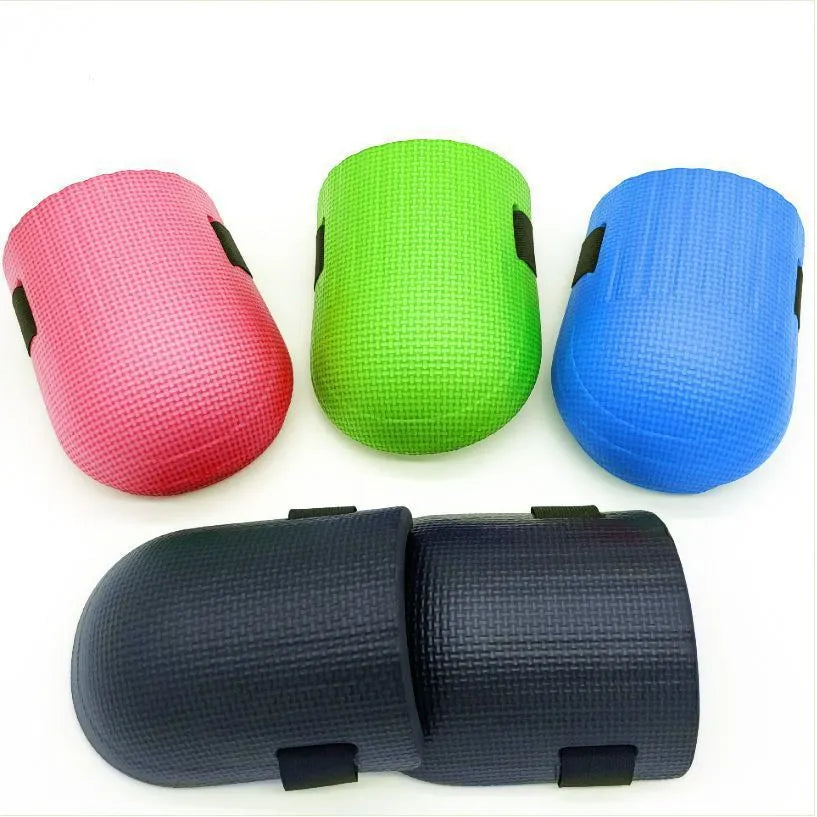 A pair of EVA foam kneepads in assorted colours, showing their thickness for knee protection.