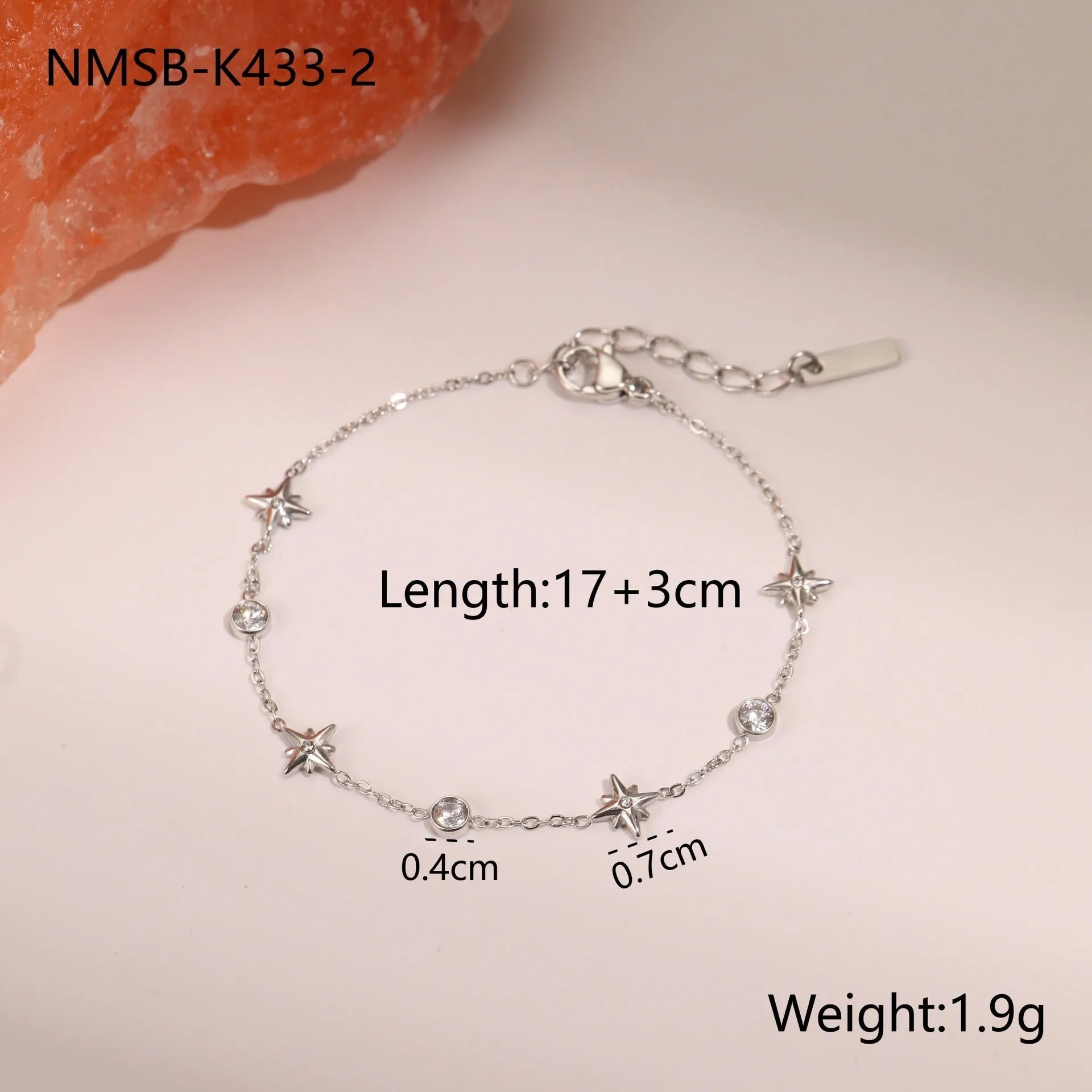 Ins Titanium Steel women's bracelet with 18K gold plating and a geometric zircon star pendant.