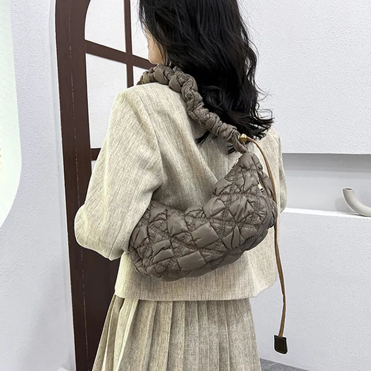 Women's nylon shoulder messenger bag in beige colour showing dimensions and adjustable strap