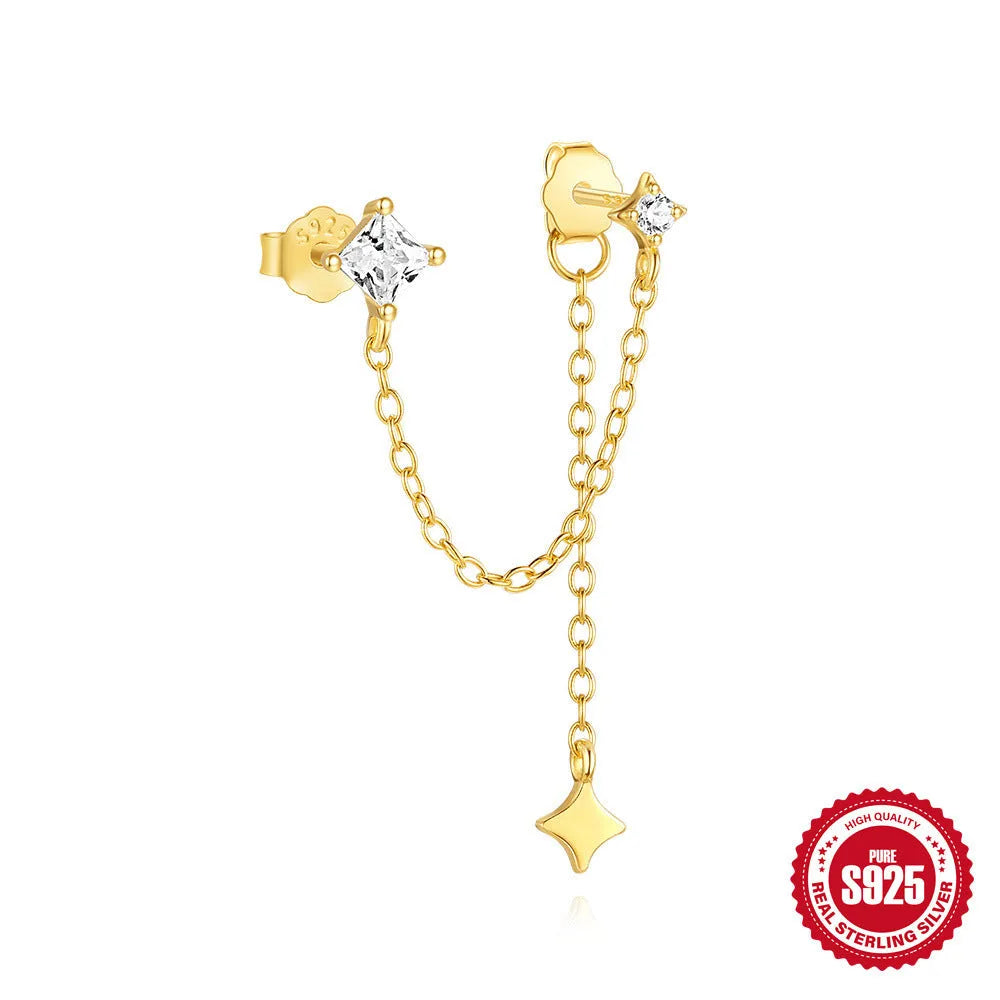 Close-up of a golden double ear piercings chain design stud earring made from S925 sterling silver with inlaid zircon stone.