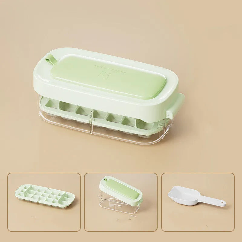 Blue food-grade plastic ice cube tray with grid design and integrated ice shovel storage.