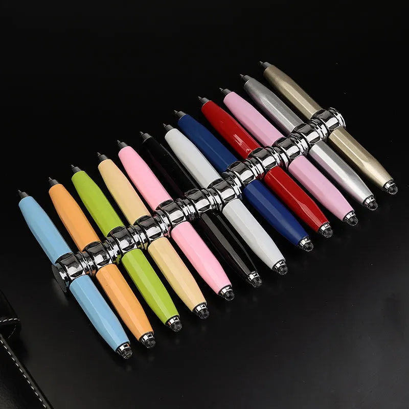 Metal ballpoint pen with integrated fingertip spinner and LED lights, shown in hand