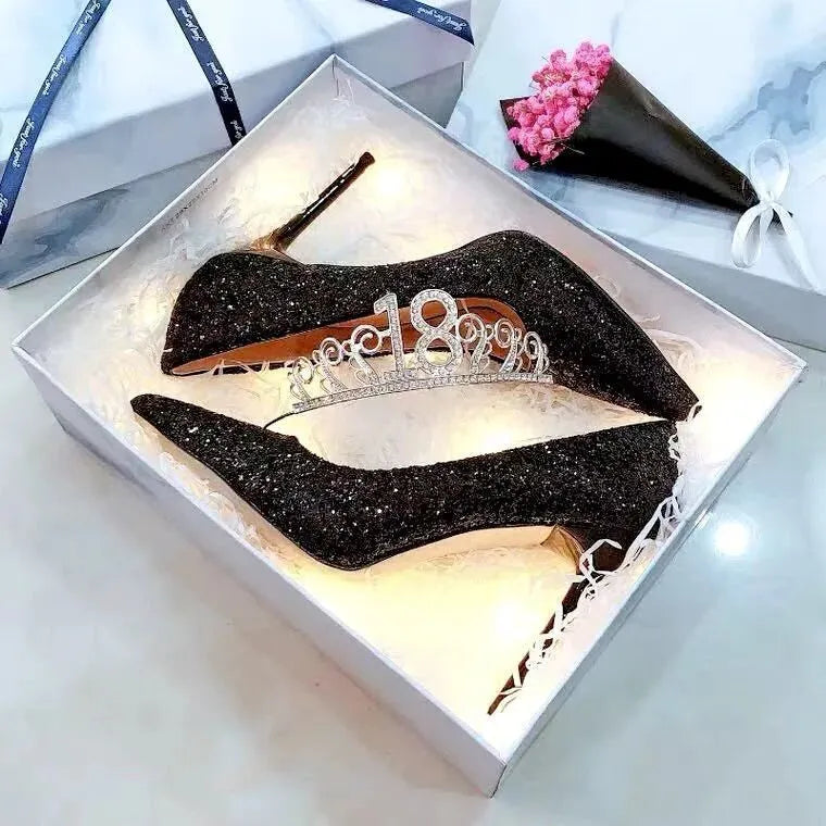 Women's silver and black bridal wedding shoes with crystal details and multiple heel heights