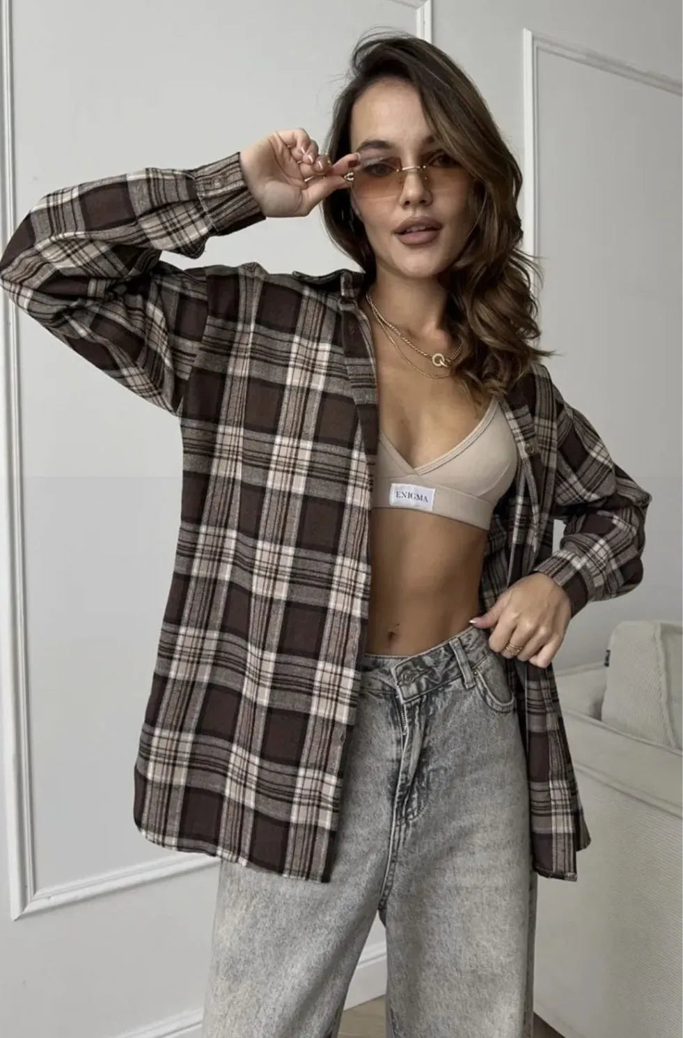 Dark brown retro striped women's shirt with long sleeves and V-neck collar