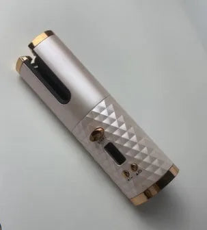 White portable mini curling iron with USB charging port and adjustable temperature dial.