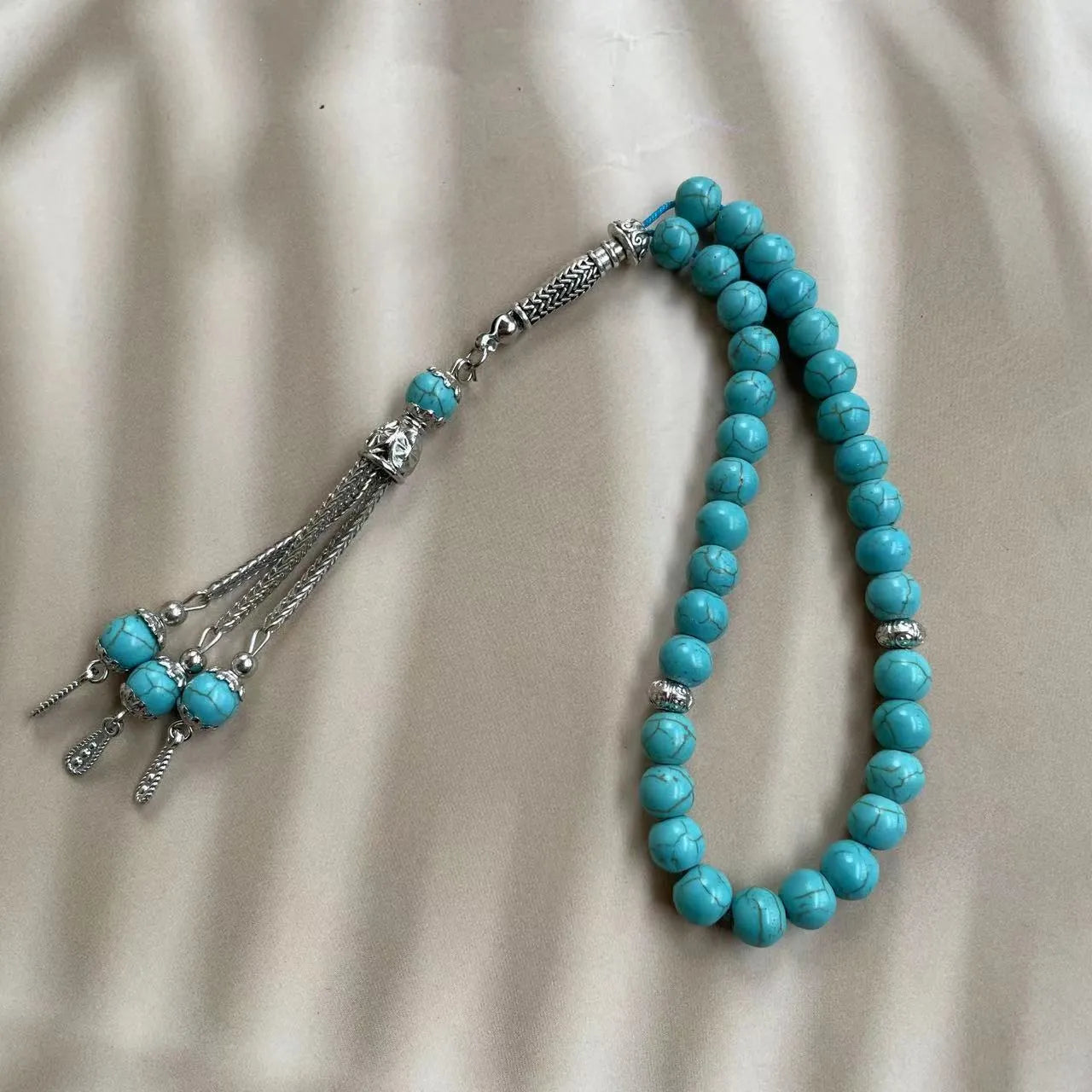 Handmade sky blue stone Muslim worship bracelet with 8mm beads on wrist