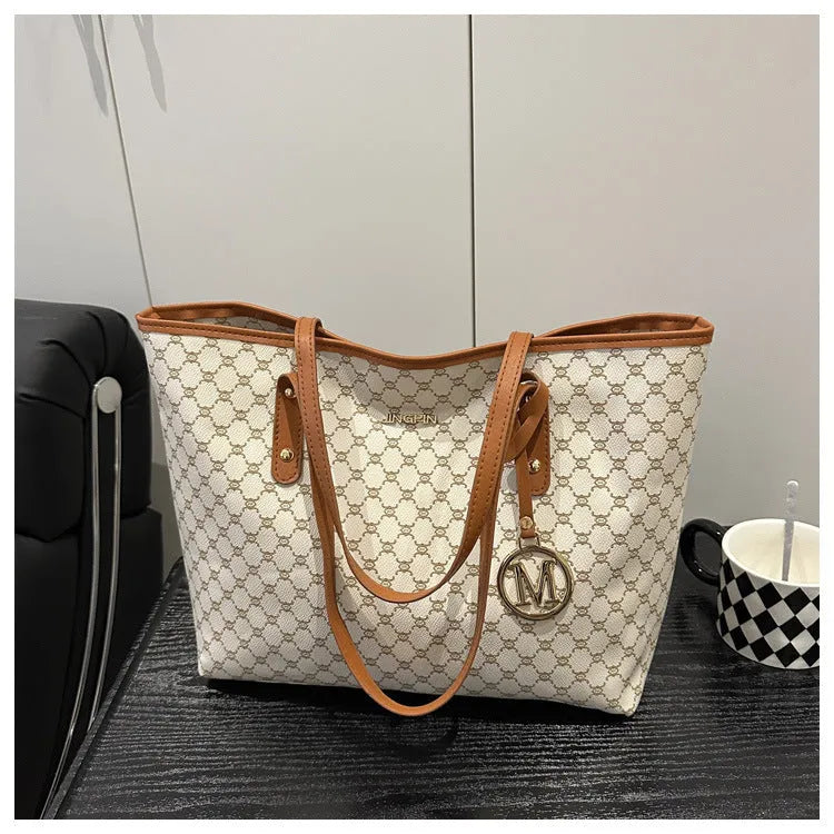 Western style black PU leather shoulder bag with sewing thread details and structured design