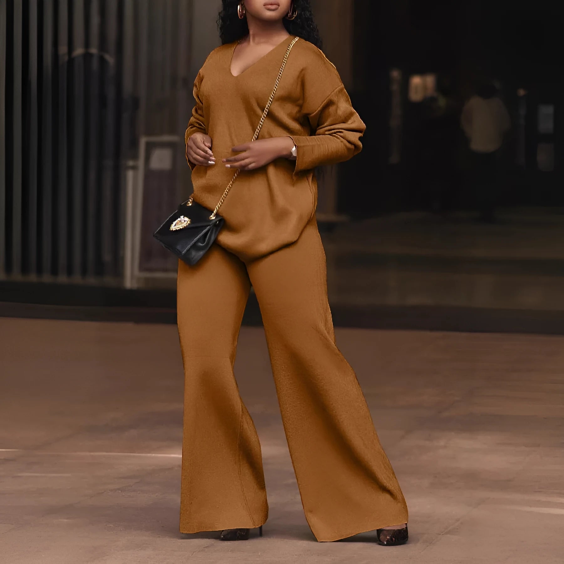 Women's brown suede velvet two-piece lounge suit with split sleeves on the long-sleeved top.