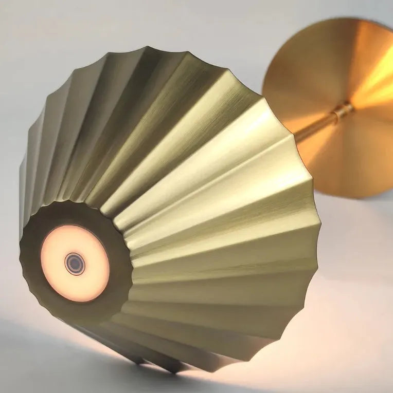 Gold-coloured alloy desk lamp with a fabric lampshade, showing a USB Type-C charging port.