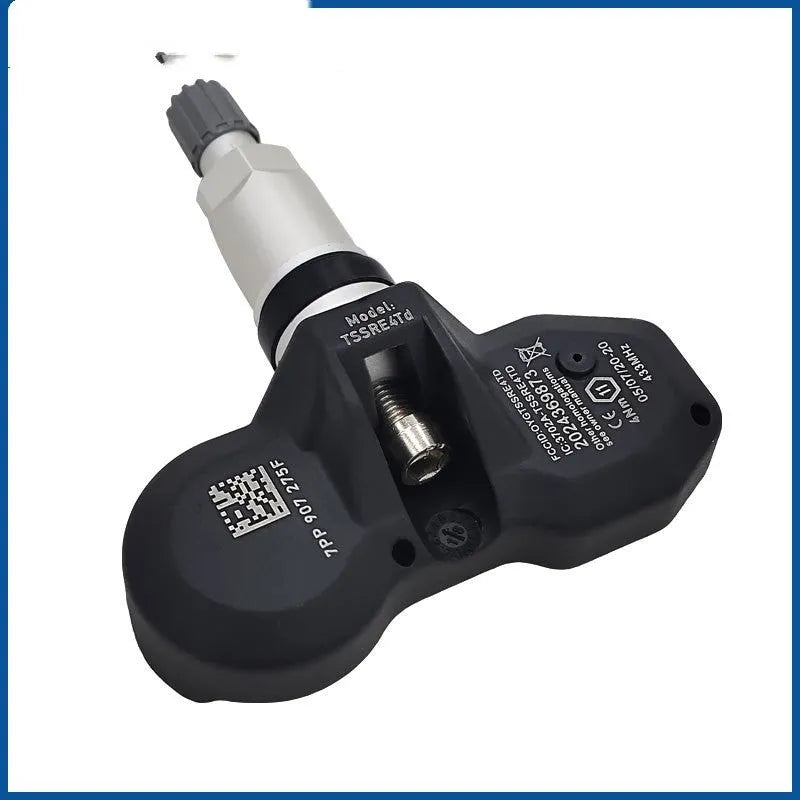 Black Audi car tyre pressure monitor sensor for TPMS replacement.
