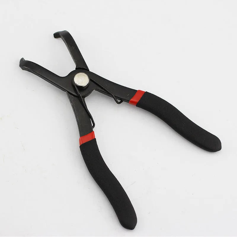 Red handled round nail removal pliers with adjustable jaws for door panel fasteners.