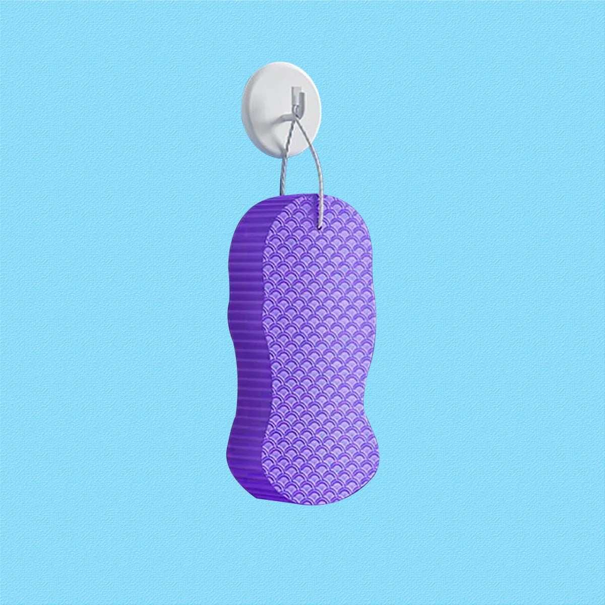 White 3D fish scale pattern bath sponge ball on a bathroom surface