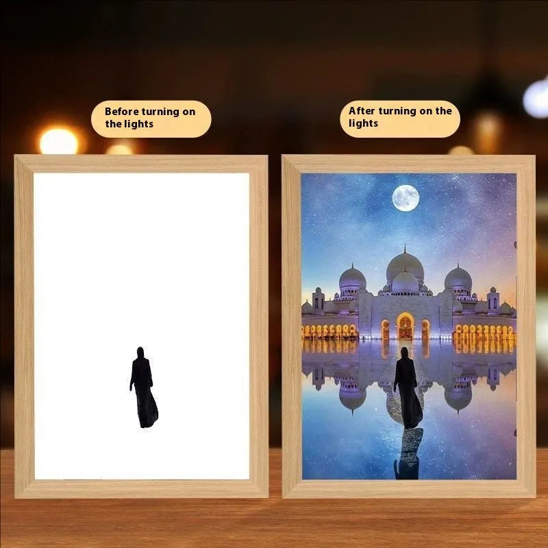 Modern rectangular LED photo frame displaying changeable sea scene artwork with built-in illumination