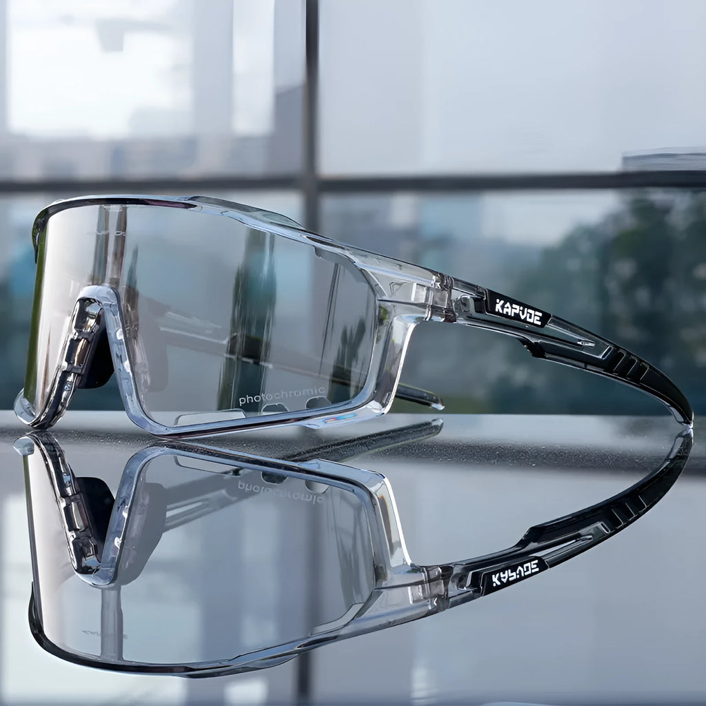 Semi-rimless photochromic cycling glasses with a TR90 frame, shown in a sport setting.