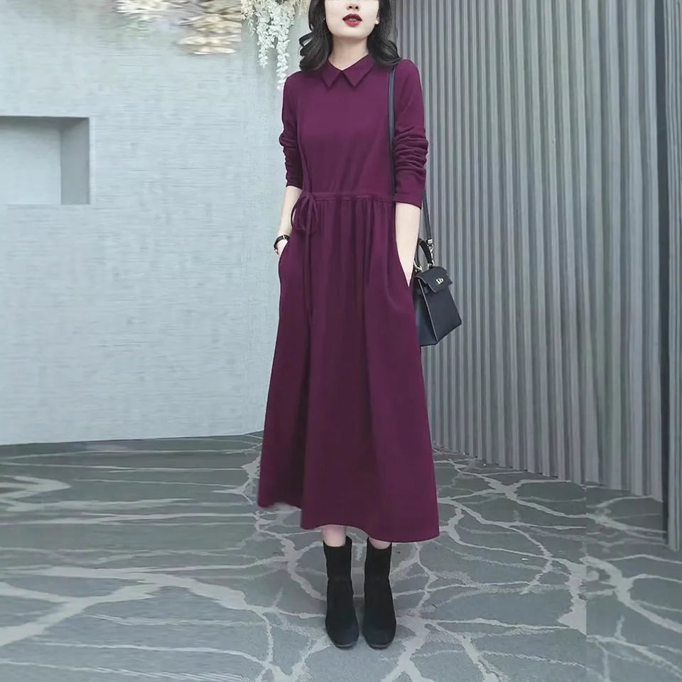 Purplish red plus size women's dress with long skirt and extra long sleeves for urban office wear
