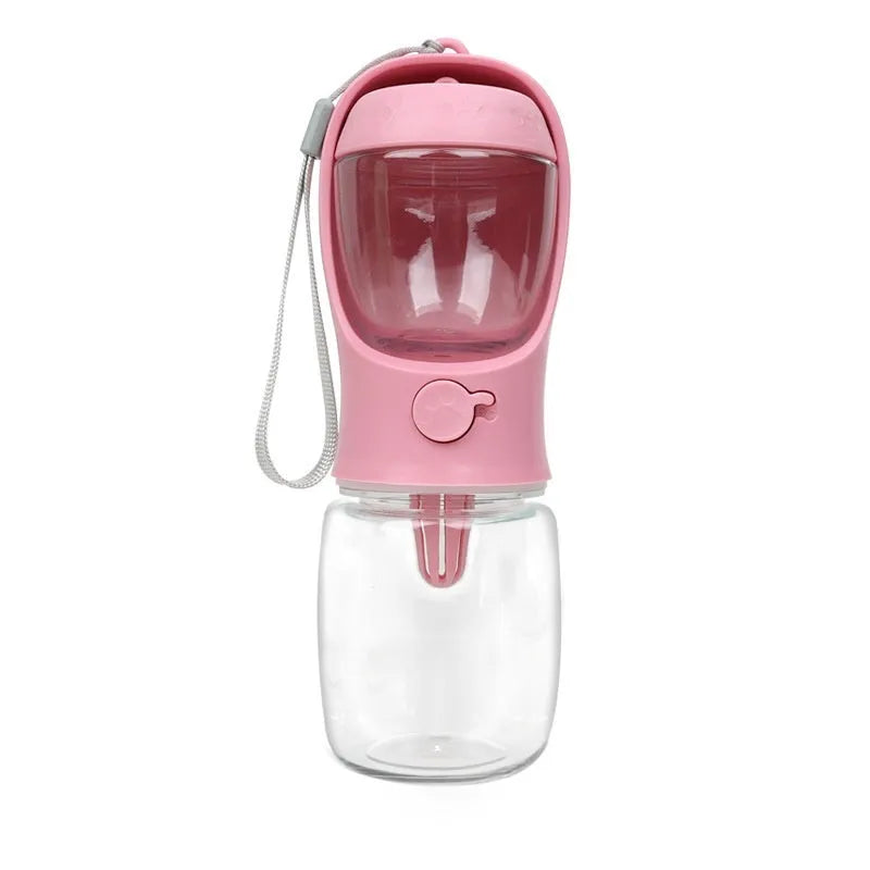 Blue portable plastic dog drinking cup with integrated bowl, showing dual-use design for outings.