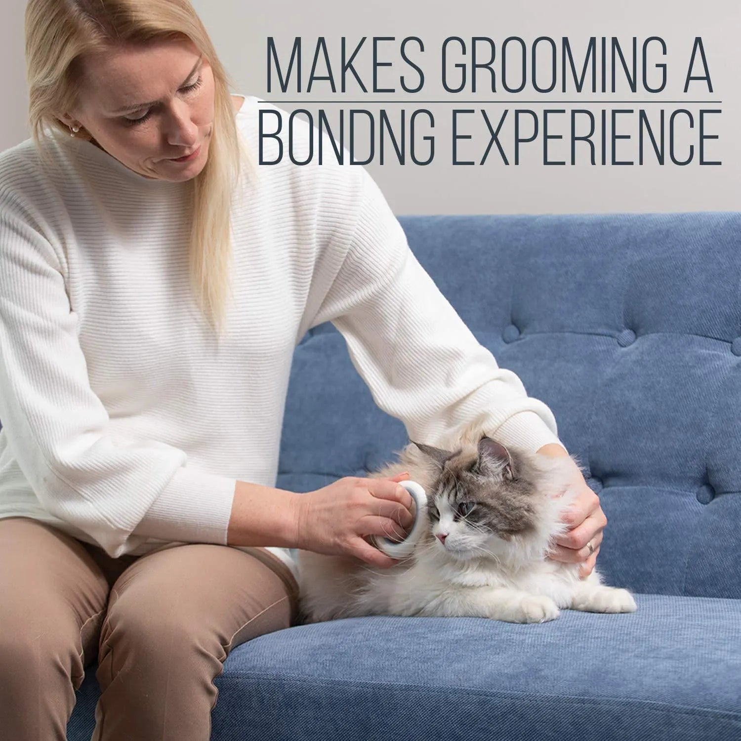 Blue pet grooming comb for cats and dogs on a white background.