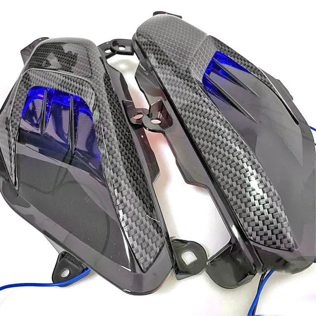 Pair of carbon fibre style LED side lamps for Yamaha NMAX125 and NMAX155 scooters.