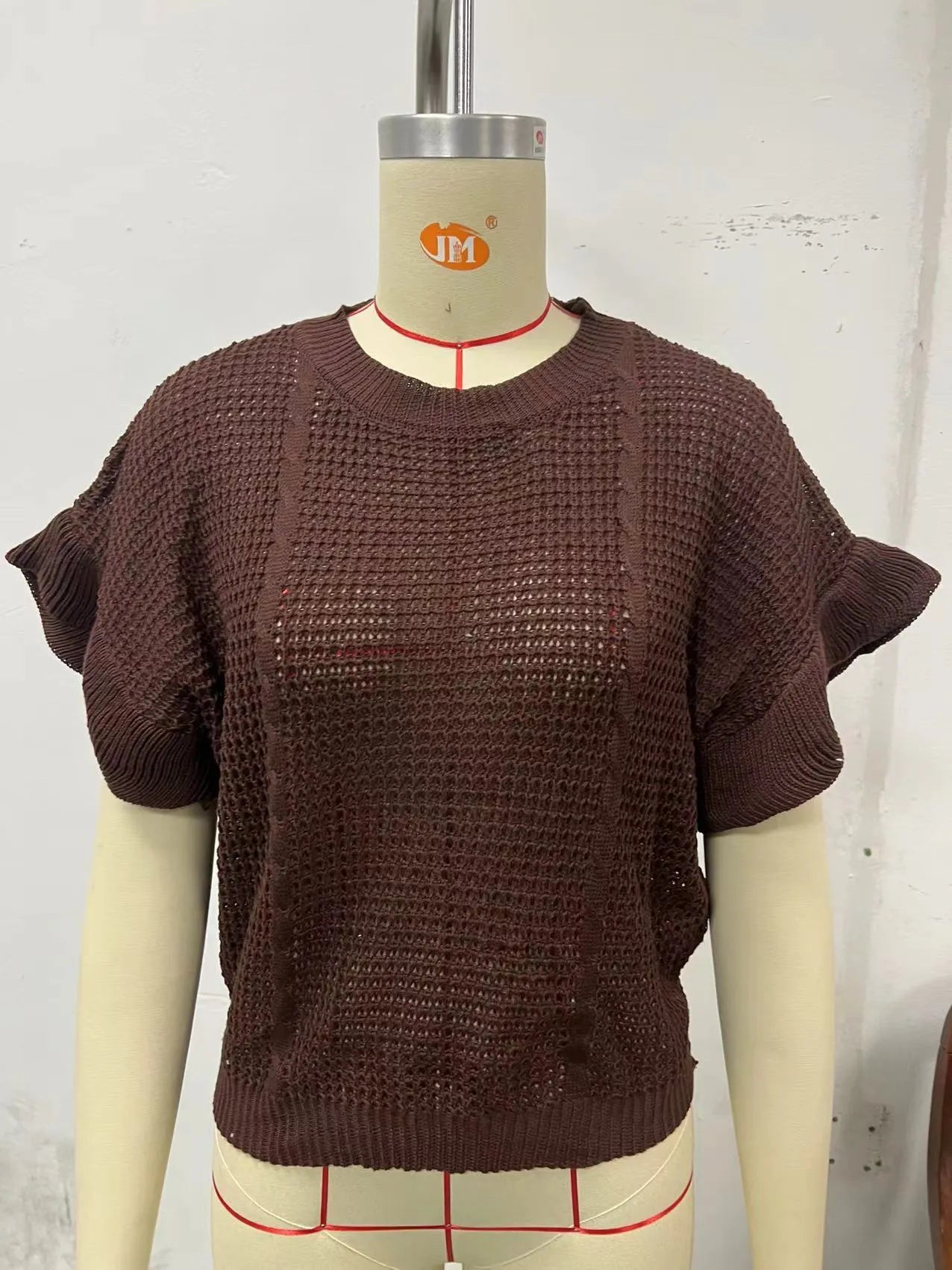 White knitted pullover sweater with ruffled short sleeves and twisted string 3D pattern texture