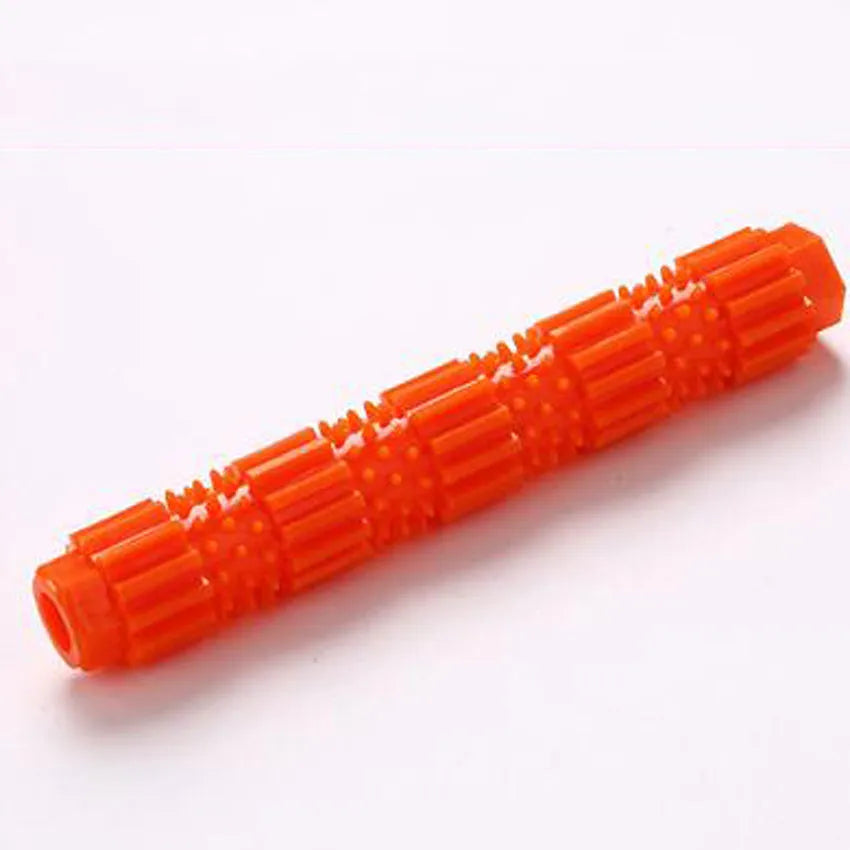 Green durable rubber dog chew toy with treat-dispensing hole and squeaker, for aggressive chewers.