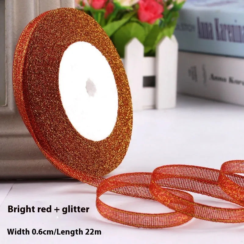 Roll of narrow 0.6cm wide polyester gift wrapping ribbon in assorted colours, showing 22 metre length.