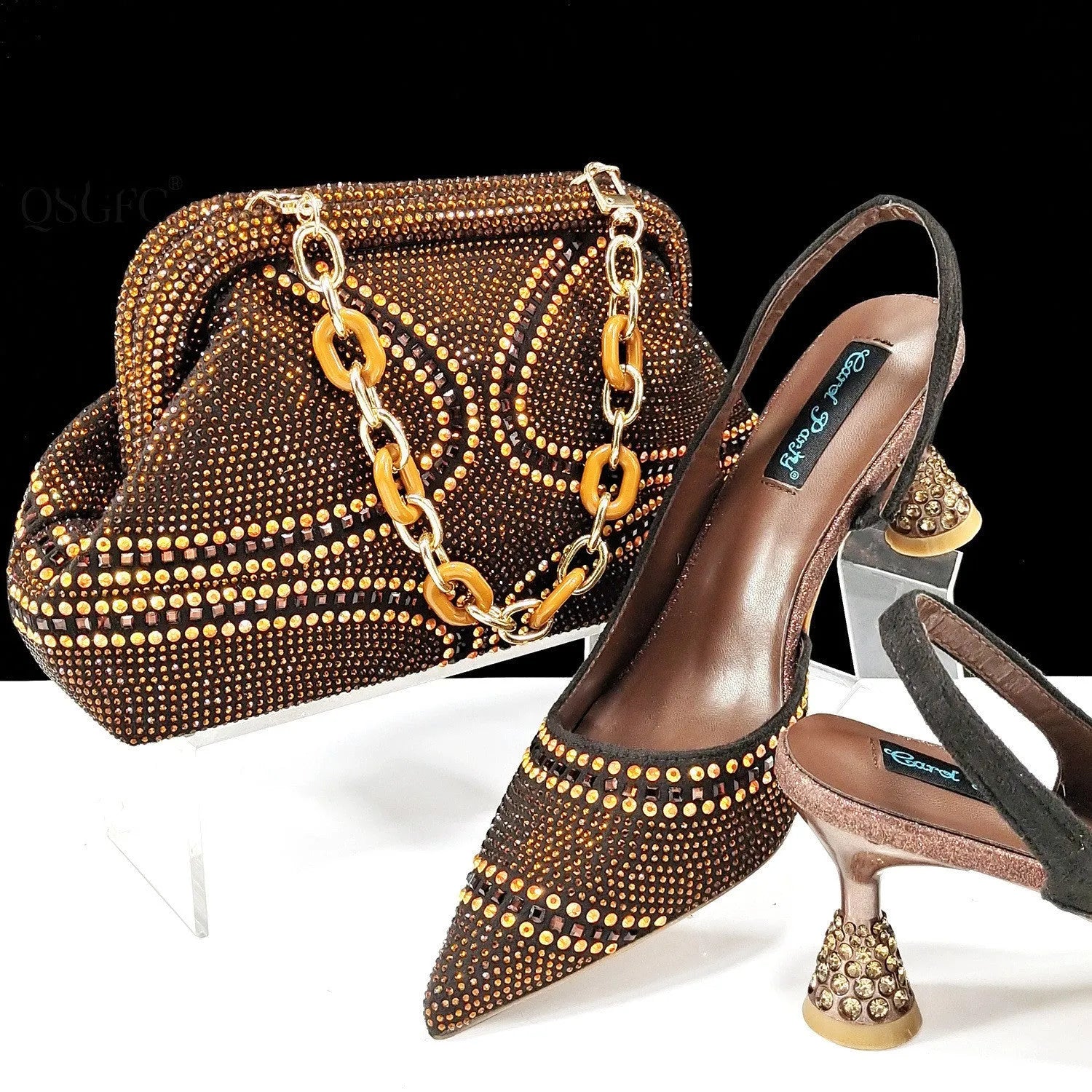 Women's pointed toe high heels with matching small bag, shown in a selected colour with a wine glass heel and rhinestone detail.