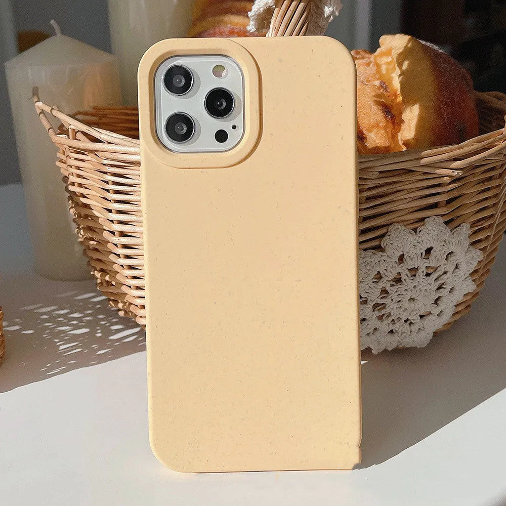 Fully degradable wheat straw fibre phone case for iPhone on a white background.