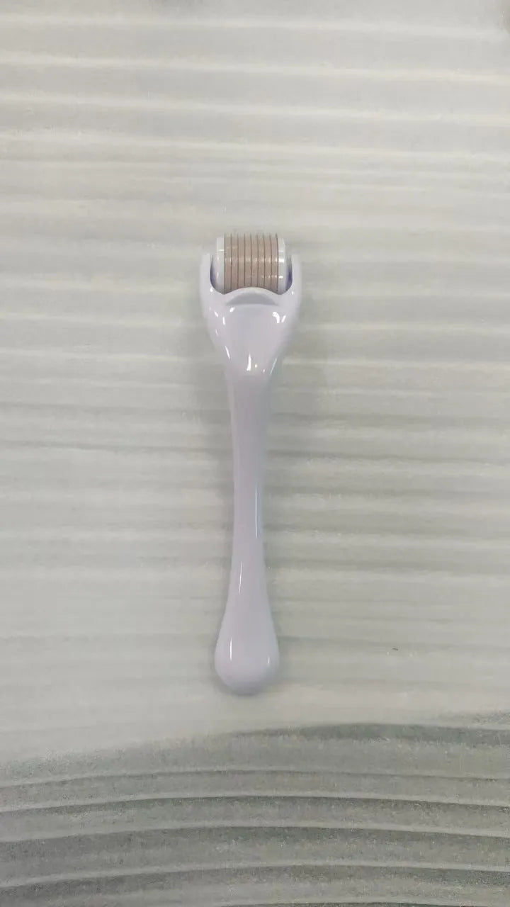 540 micro needle derma roller showing handle and wheel in different colour combinations with size specifications