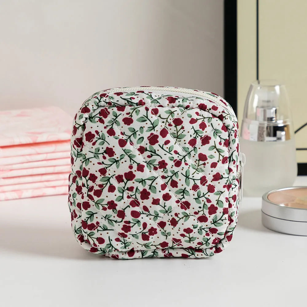 Breathable polyester key storage bag showing multiple floral and cherry pattern options including white background designs