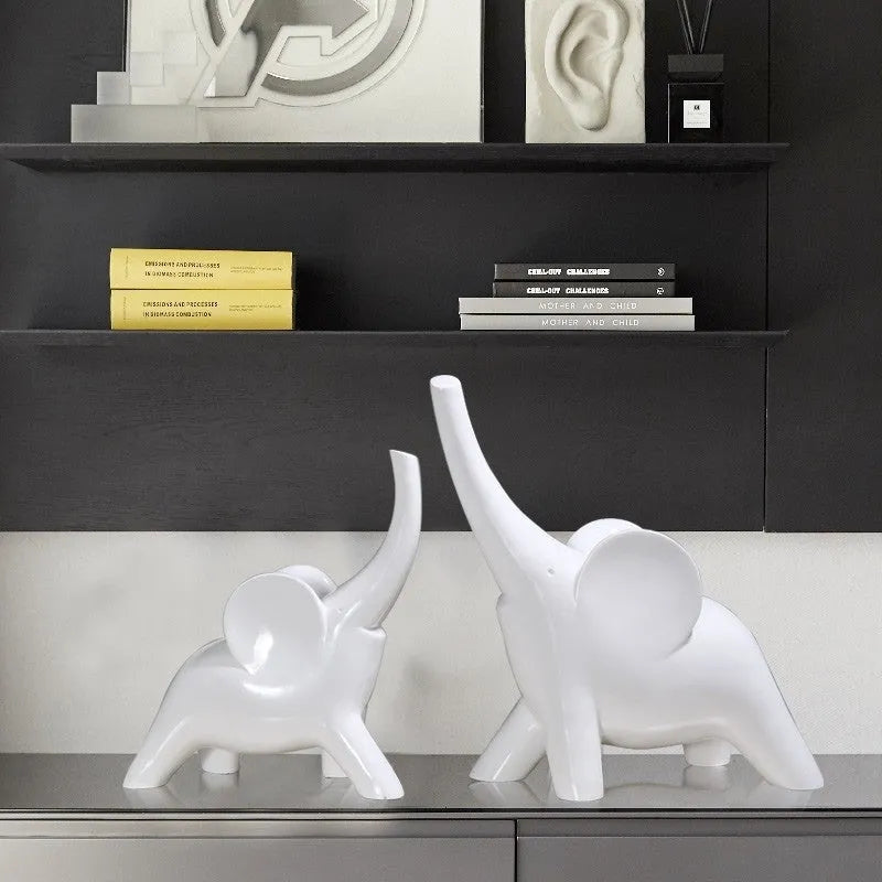 Modern resin elephant ornament in rose gold or white finish, available in large and small sizes