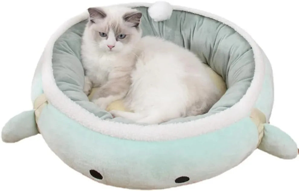 Green dinosaur and chick-shaped cat bed shown both flat as a sofa and hanging as a hammock for small pets.