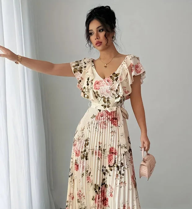 Apricot floral print dress with V-neck, ruffled sleeves, and pleated swing skirt