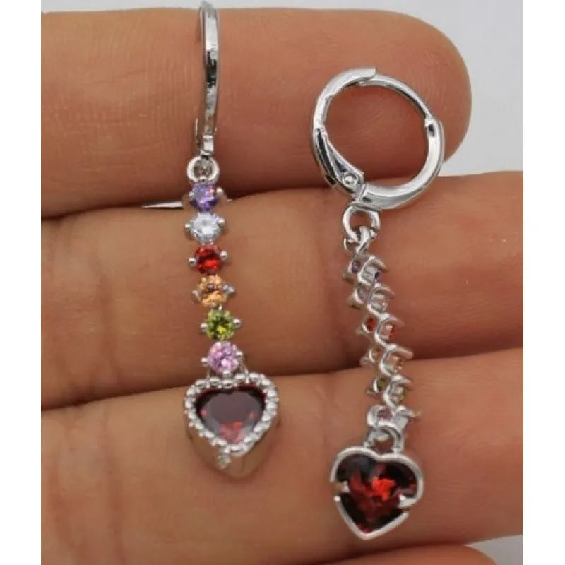 A pair of women's heart-shaped alloy earrings with an electroplated gold or silver finish.