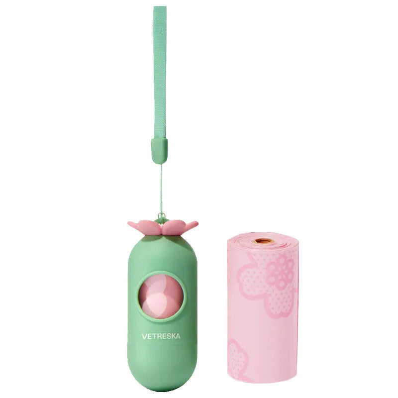 Dog poo bag dispenser capsule with scented refill roll in strawberry pattern design