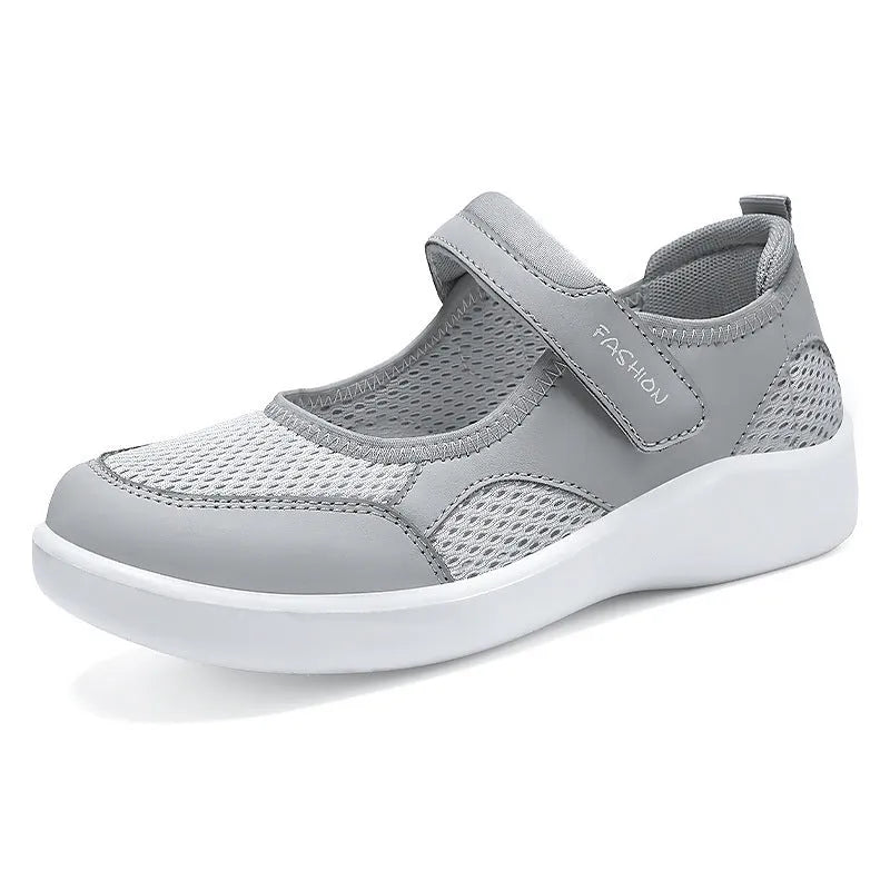 Women's grey mesh casual shoes with velcro fastening and round toe design