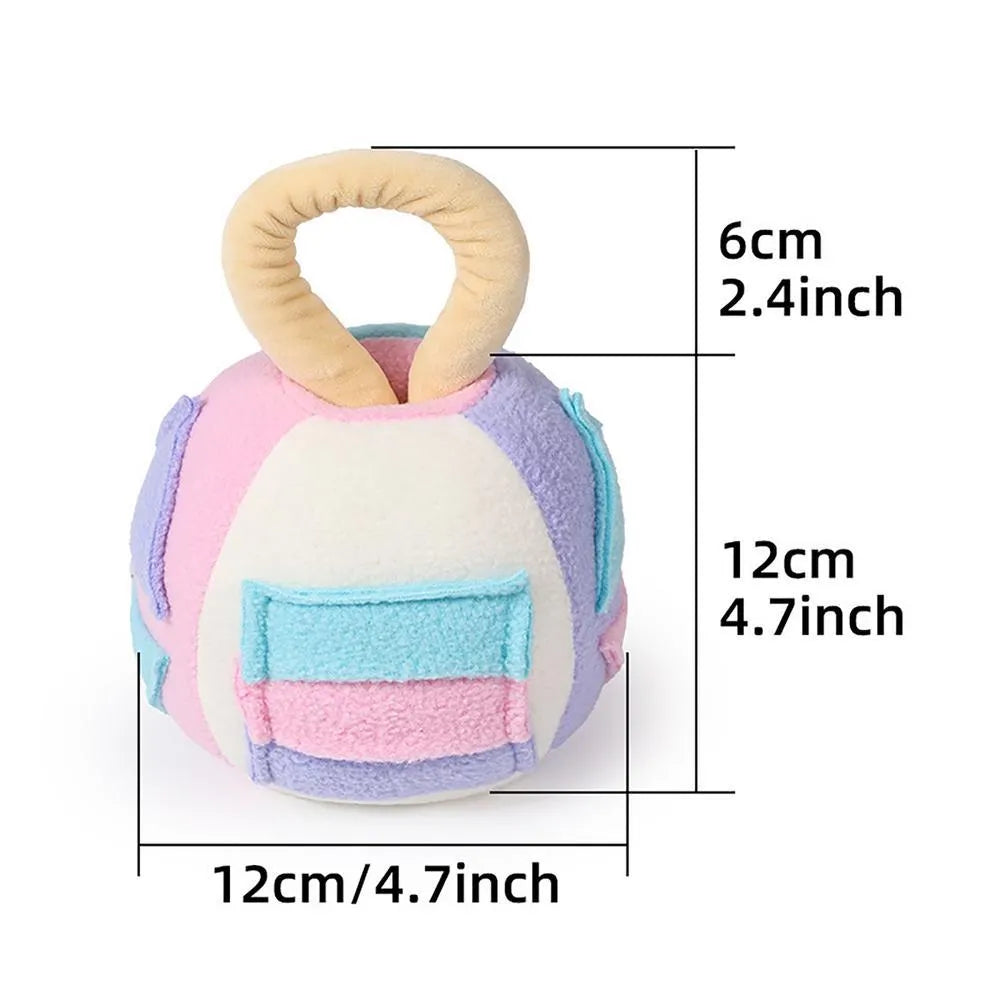Green or pink polyester plush ball dog toy with treat pockets and a squeaker, shown next to dog treats.
