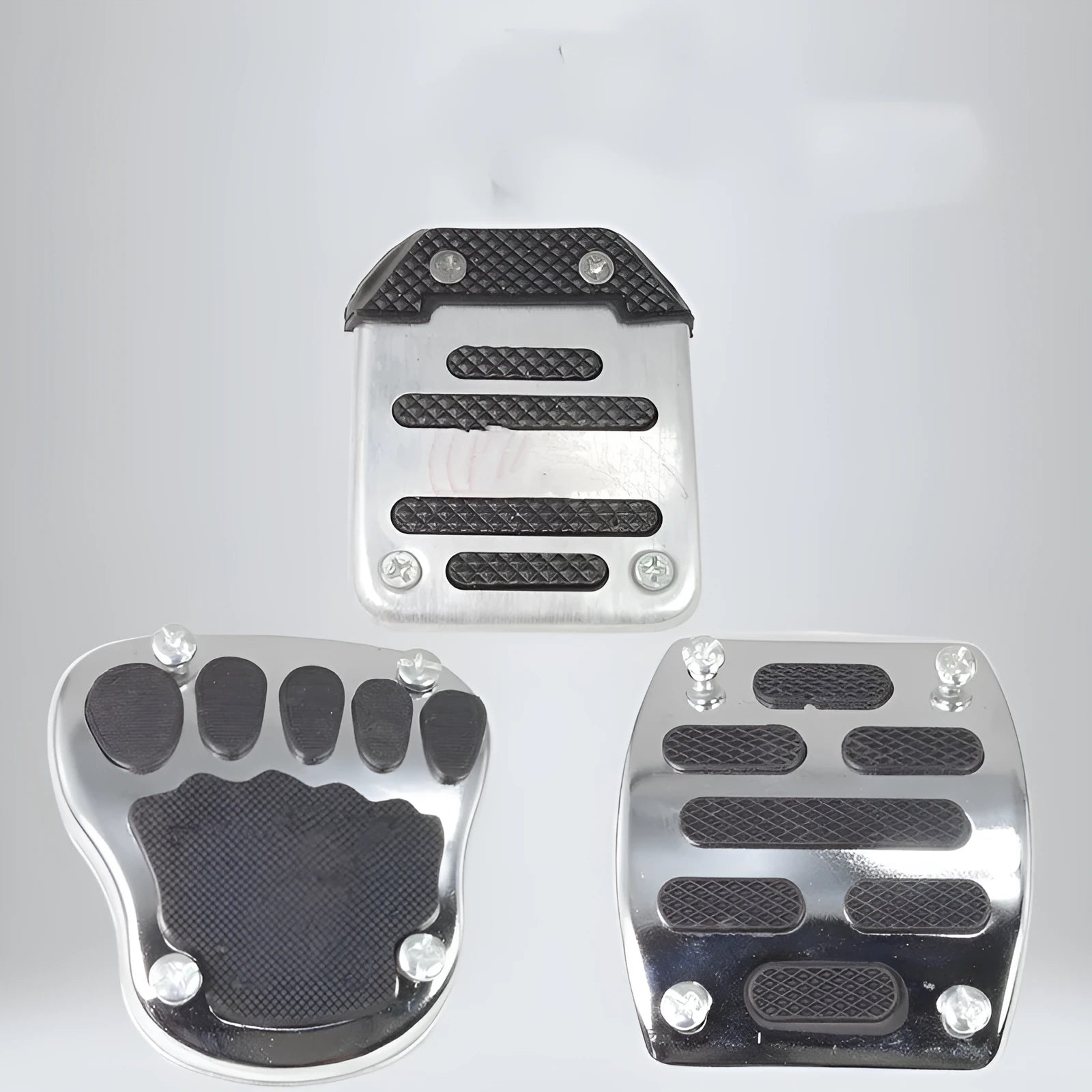 Metal motorcycle brake pedal skid plate replacement part showing three colour options