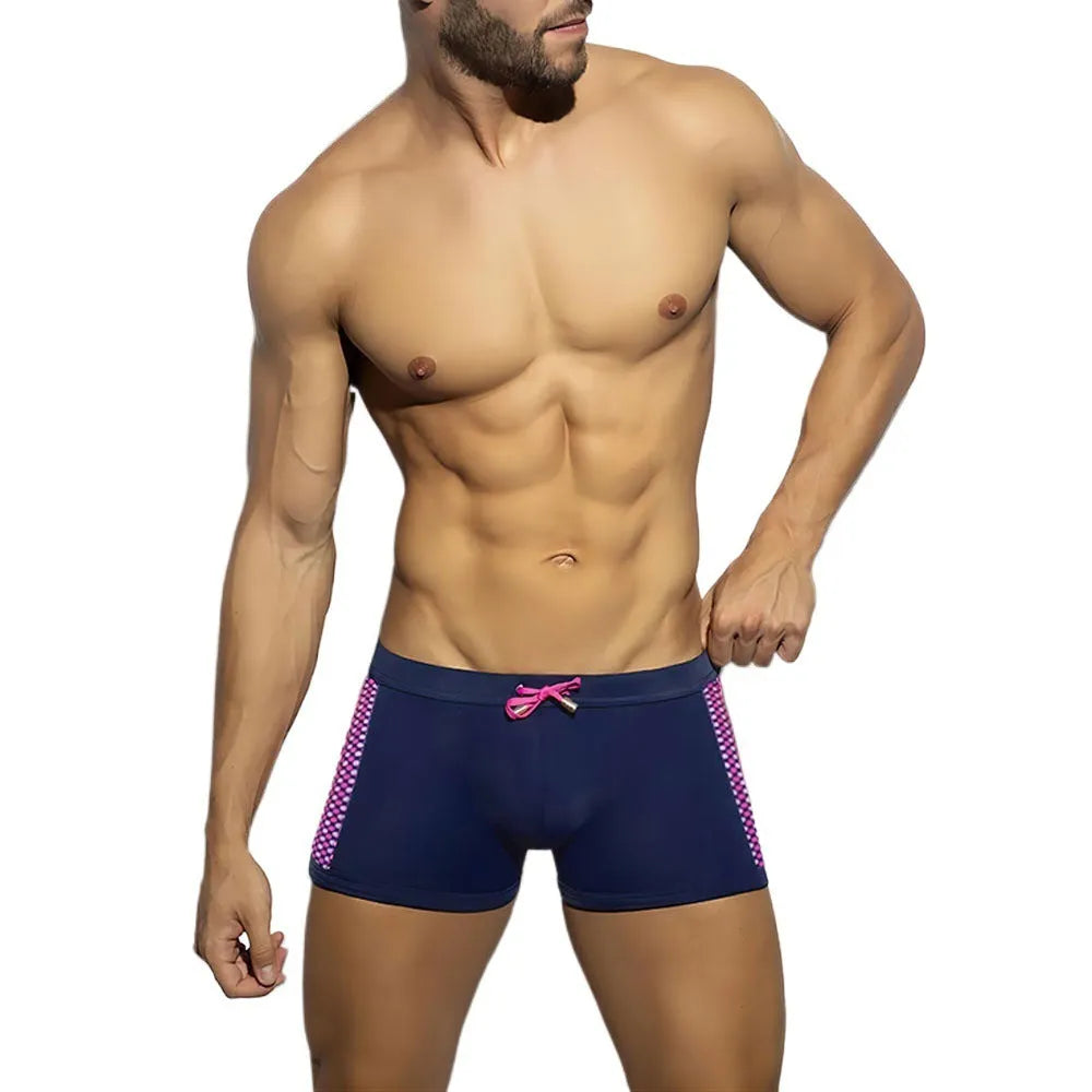 Men's polka dot print quick-dry swimming boxers in black, dark blue, or yellow.
