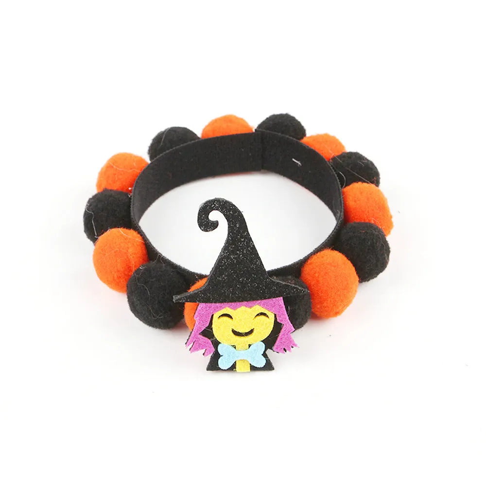 Halloween pet collar with fur ball decorations in pumpkin, skull, witch and bow designs